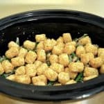 Picture of crock pot tater tot casserole before baking.