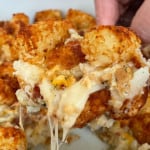 Cheese pull on a tater tot casserole.
