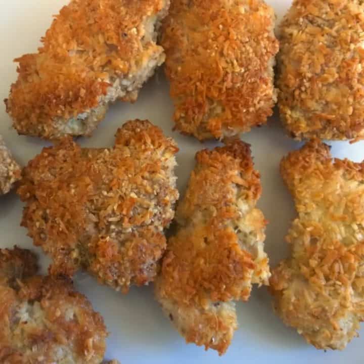 This recipe for Crispy Coconut Chicken is my favorite way to make crispy chicken thighs with boneless skinless thighs. It's Paleo, Low Carb, and Whole30! #paleo #whole30 #keto #lowcarb #lowsugarrecipes #lowsugarsnacks #ketochickenrecipe #lowsugardiet #paleorecipe #paleodessert #paleosnacks #crispychickennuggets