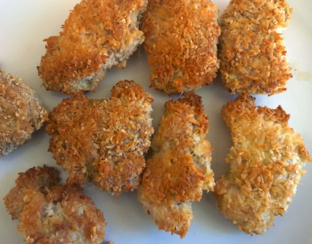 This recipe for Crispy Coconut Chicken is my favorite way to make crispy chicken thighs with boneless skinless thighs. It's Paleo, Low Carb, and Whole30! #paleo #whole30 #keto #lowcarb #lowsugarrecipes #lowsugarsnacks #ketochickenrecipe #lowsugardiet #paleorecipe #paleodessert #paleosnacks #crispychickennuggets