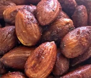 Close-up photo of barbecue roasted almonds.