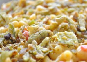 Close-up photo of a crispy fried jalape&ntilde;o topping spicy jalape&ntilde;o macaroni and cheese.