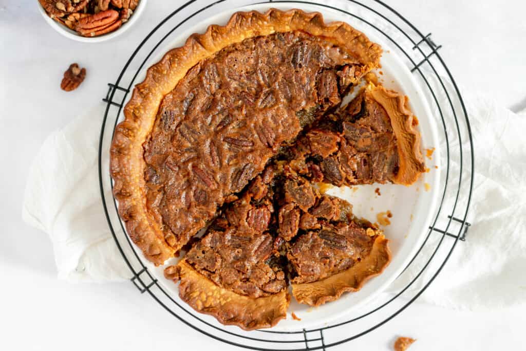 Old fashioned pecan pie without corn syrup on a cooling rack.