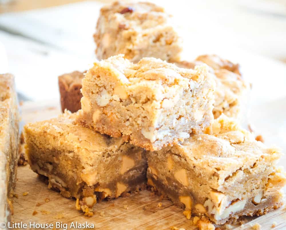 Stack of butterscotch brownies cooled and cut.