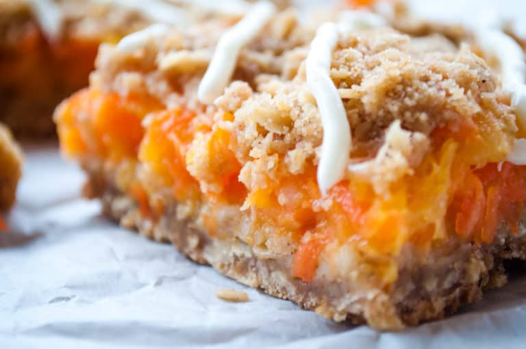 Close-up photo of carrot cake cookie showing its layers.
