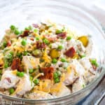 A bowl of potato salad with all the goodies.