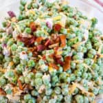 Close-up photo of bacon pea salad.