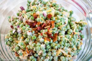 Close-up photo of bacon pea salad.