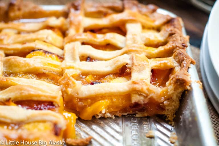 Close-up photo of nectarine slab pie showing its delicious filling.