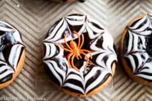 Spider ring added to the web-designed doughnuts.