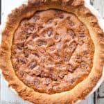 Freshly baked old-fashioned chocolate pecan pie with a gold brown crust.