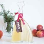 Homemade apple cider vinegar in a decorative bottle, perfect for gifting.