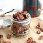 A jar full of keto candied pecans.