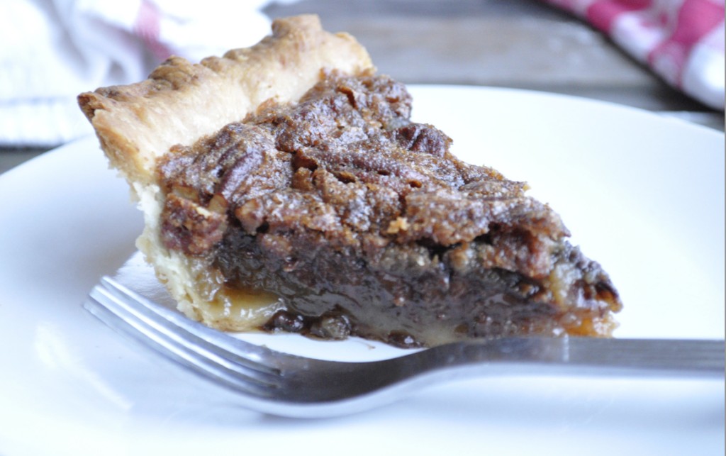 A slice of chocolate pecan pie.