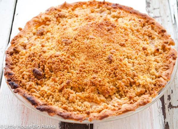 Freshly baked crumb top Dutch apple pie.