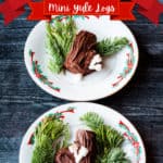 No bake mini Yule Log Cakes served on plates with festive decorations.