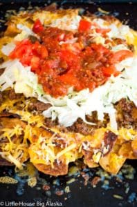 Stacking the ingredients to make the baby Yoda nachos!