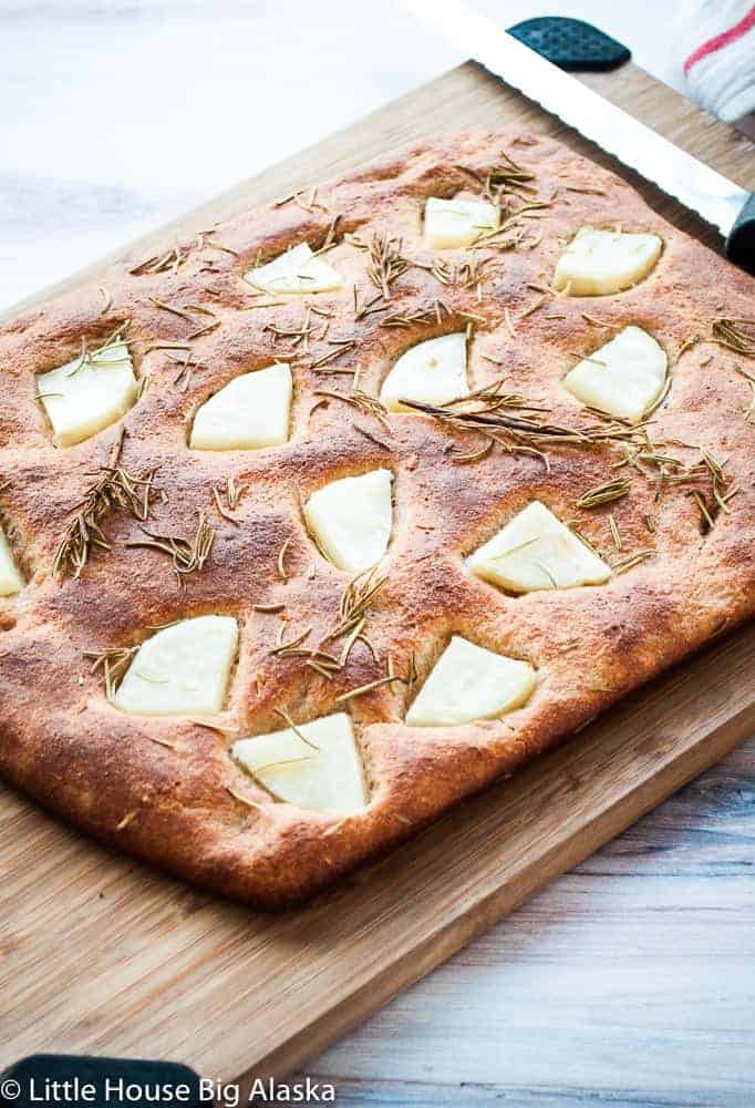 Freshly baked easy potato spelt focaccia bread recipe.