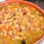 A hearty bowl of ham and bean soup.