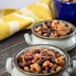 Bowls of slow cooked baked beans.