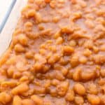 Baked beans in a baking dish.