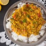 Rice topped with moong dal tadka.