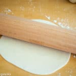 Dough rolled flat.