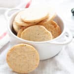 Stack of homemade parmesan crackers in a bowl.
