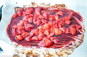 Juicy, roasted strawberries with a sweet and tangy aroma.