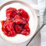 Roasted strawberries served over fresh yogurt.