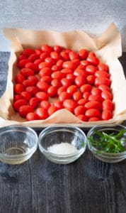 Ingredients for oven-roasted grape tomatoes.