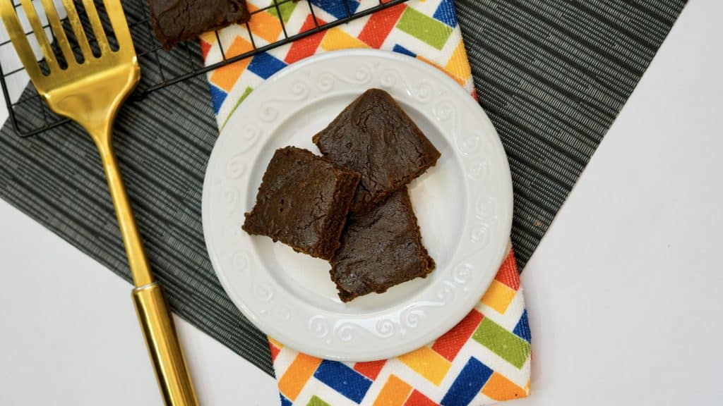 Pumpkin brownies in a white plate.