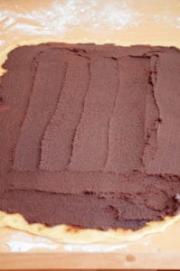 Chocolate Babka filling spread over the dough.