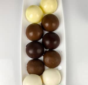 Chocolate bomb shells in different colors.