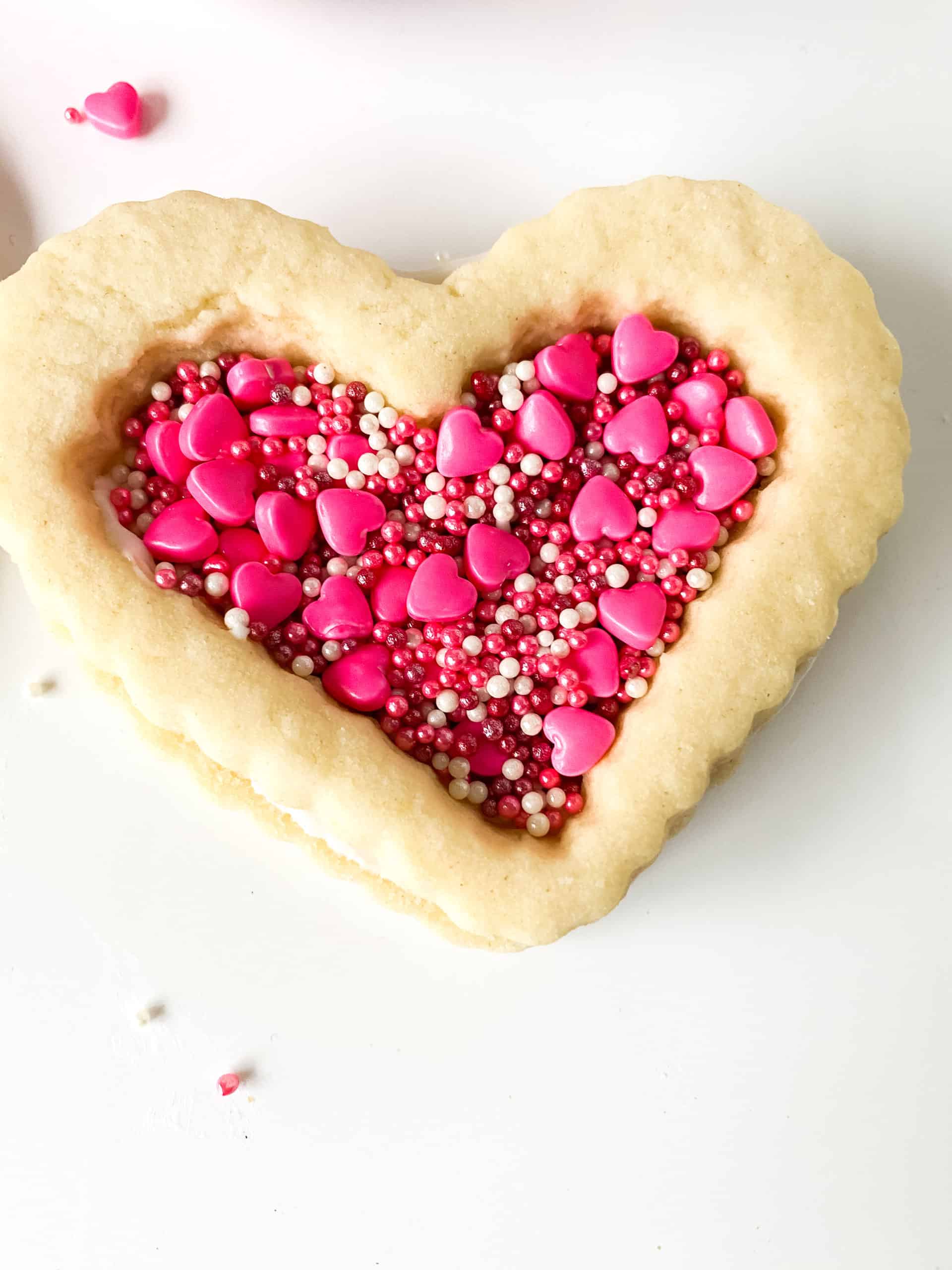 a single filled heart shaped valentine cookie.