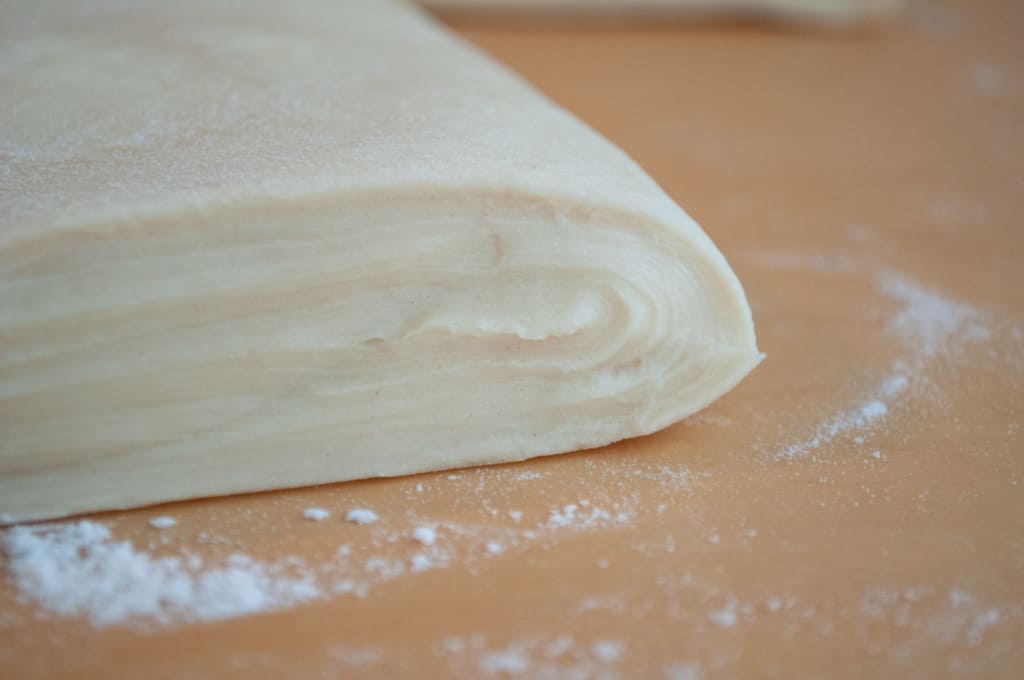 Layers of dough in laminated danish pastries. 