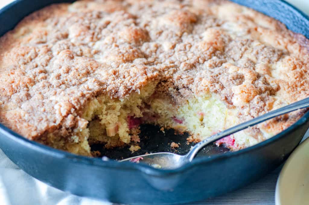Rhubarb cake studded with fresh tangy rhubarb and topped with streusel.