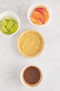 Filling the apple tart.