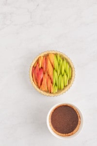 Laying the apples in the apple tart.