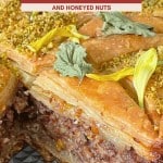 Close-up of sliced baklava showing flaky pastry layers, a nut filling, and garnishes of crushed pistachios and flower petals, with a label describing the dessert and offering a glimpse of the traditional Baklava Recipe.
