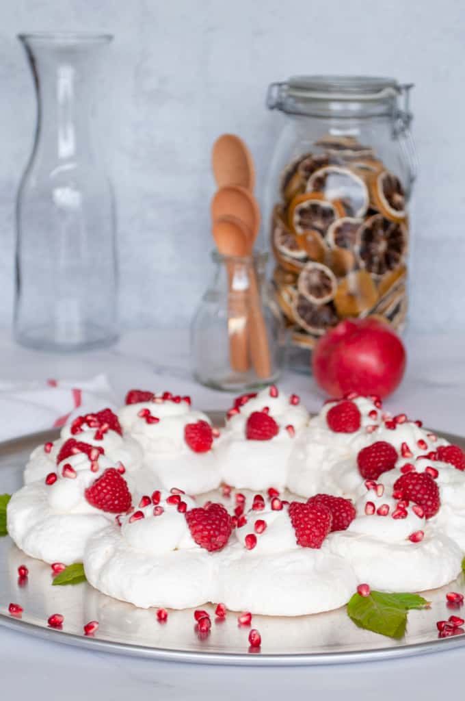 Christmas Pavlova, with cream and berries.