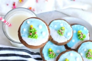 Air fryer gingerbread cookies served with a glass of milk.