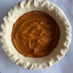Pumpkin layer in a pecan pumpkin pie.