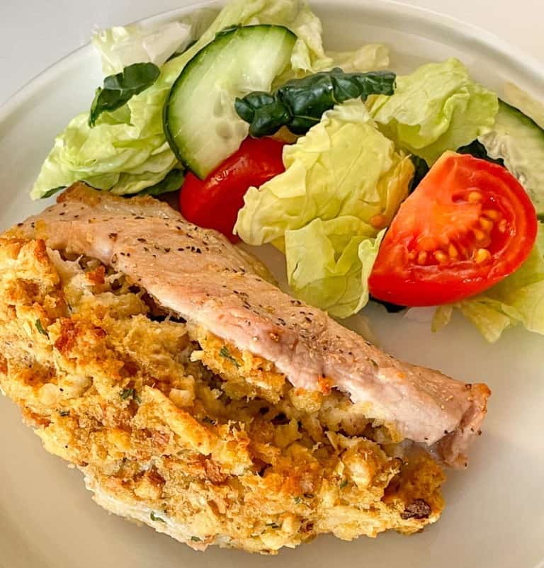 Stuffed porkchops served with salad.