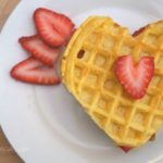 Strawberry heart shaped waffles perfect for Valentine's Day breakfast.
