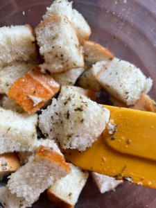 Toss to coat the bread crumbs in the oil.