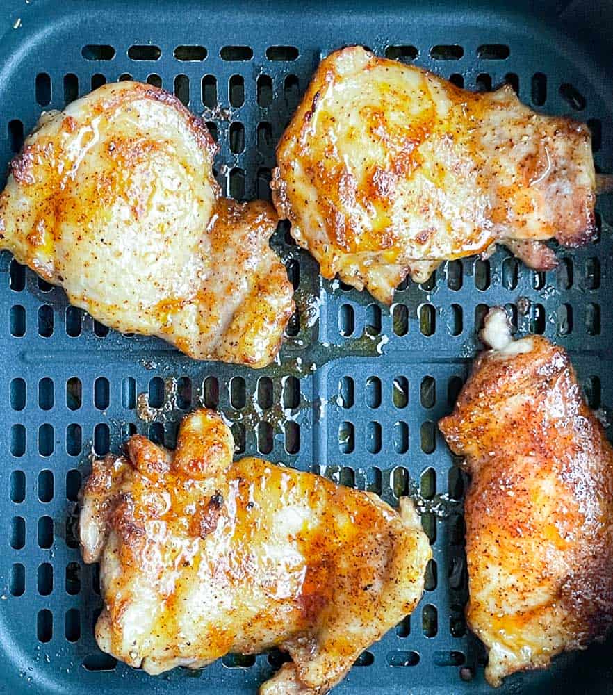 Chicken thighs in the air fryer with BBQ Rub.
