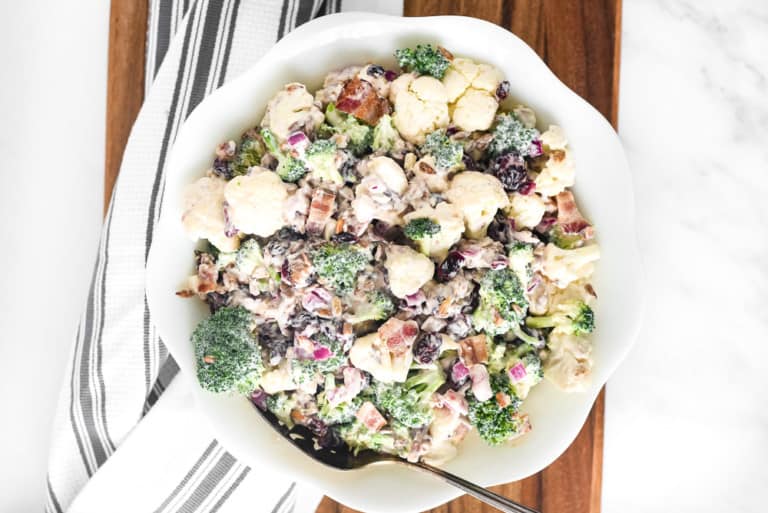 Cauliflower and Broccoli Salad in serving bowl.