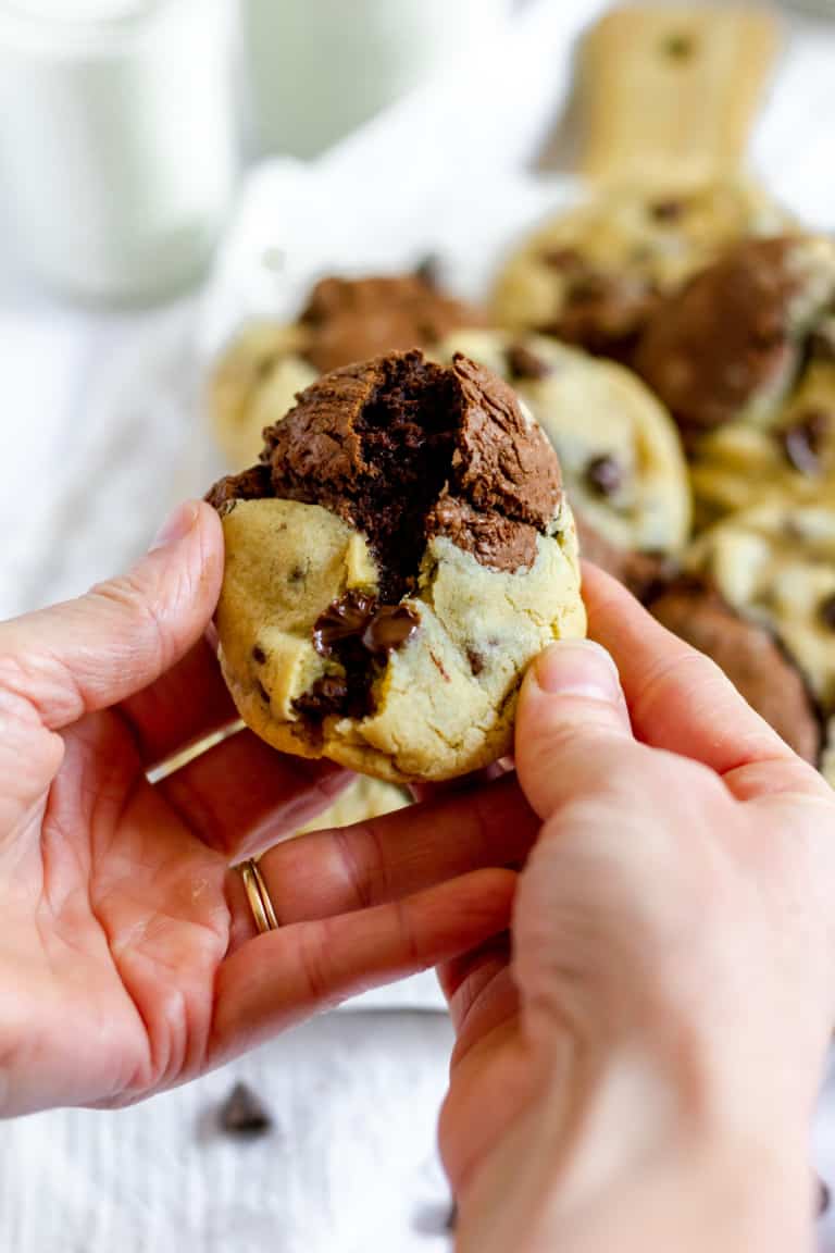 Breaking a brookie in half.