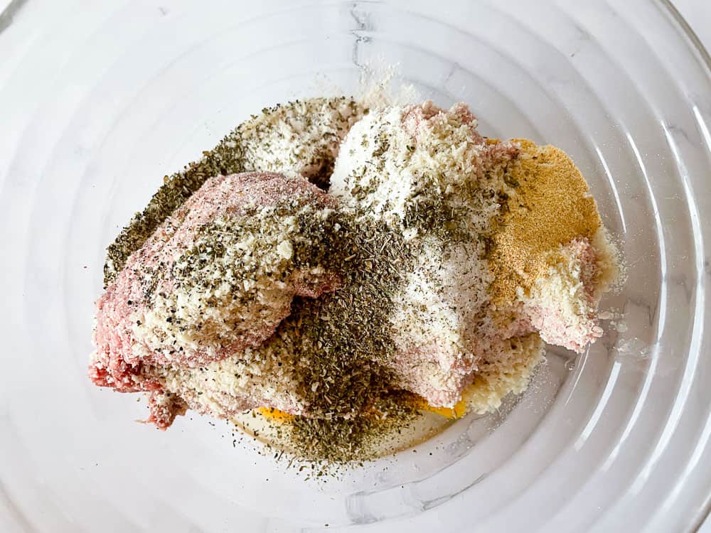 Ingredients for meatloaf in a bowl.